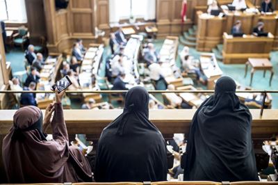Denmark bans Islamic full-face veil in public spaces 