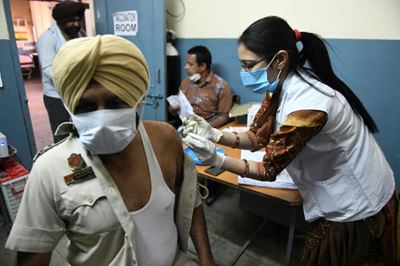 India imposes new curbs as Covid-19 cases hit record