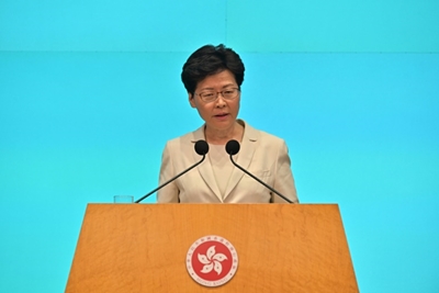 Hong Kong leader apologises for extradition law turmoil