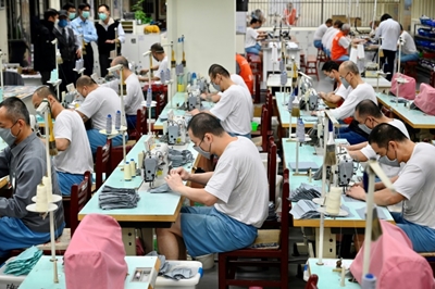 Taiwan inmates join coronavirus fight with mask factory