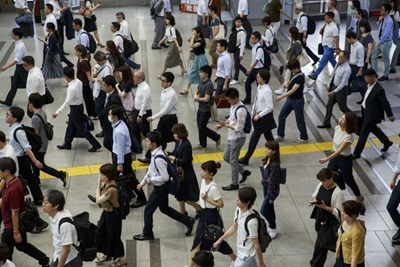 Fearing Olympic chaos, Tokyo tells workers: stay home