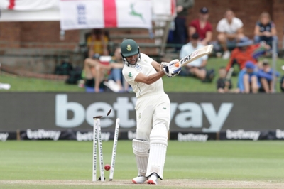 England enforce follow-on before rain stops play