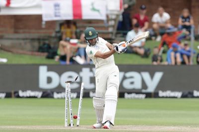 England enforce follow-on before rain stops play