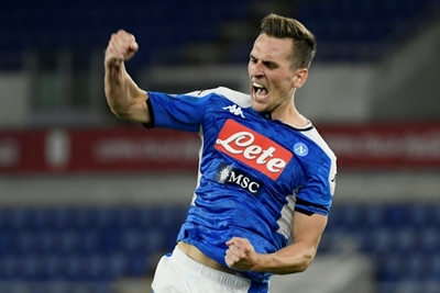 Milik, Lozano goals help Napoli win on Serie A return