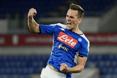 Milik, Lozano goals help Napoli win on Serie A return
