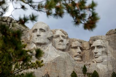 As US struggles with virus, Trump heads to Rushmore for fireworks