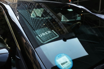 6-year boom pushes New York to mull Uber regulation
