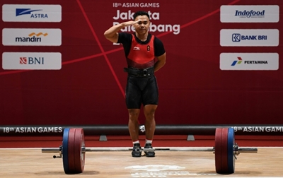 Presidential salute as Irawan lifts gold for Indonesia