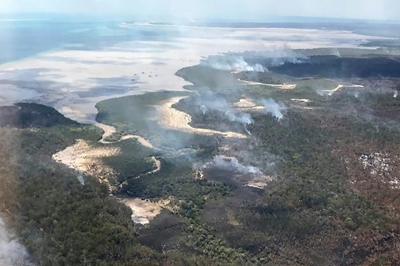 Storms help Australia contain UNESCO heritage island fire