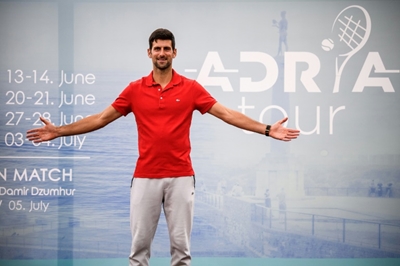 Fans welcome as Djokovic event helps tennis emerge from coronavirus