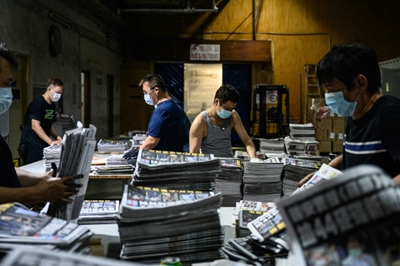 Crackdown brings resignations at embattled Hong Kong pro-democracy paper