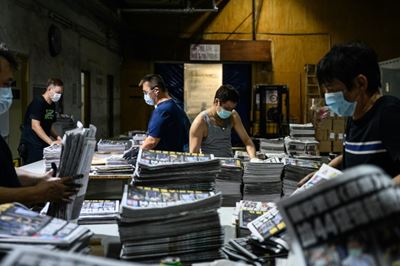 Crackdown brings resignations at embattled Hong Kong pro-democracy paper