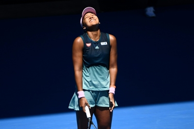 Japan's Osaka powers past injured Svitolina into Open semis