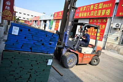 Touch wood: US trade war leaves China importers struggling