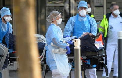 16-year-old among virus dead in France's highest daily toll