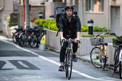 From medals to pedals: Japan Olympic fencer turns to food delivery