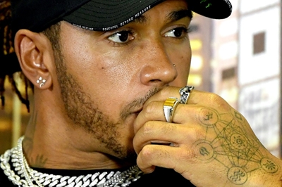 F1's Hamilton says slave trader's statue should 'stay in river'