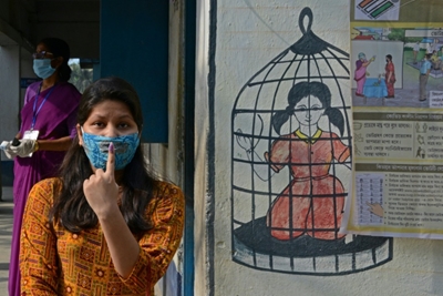 Millions vote in final phase of marathon India poll as virus cases soar