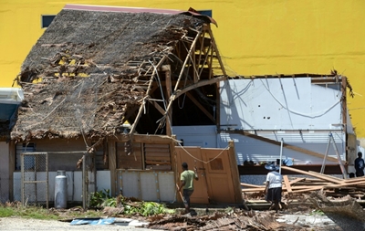 Monster storm strengthens in Pacific, lashing Vanuatu