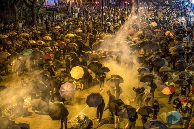 Hong Kong siege in third day as China sounds warnings