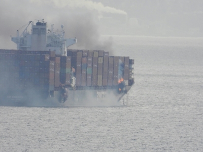 Burning cargo ship spews toxic gas off Canada's Pacific coast