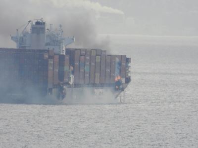 Burning cargo ship spews toxic gas off Canada's Pacific coast