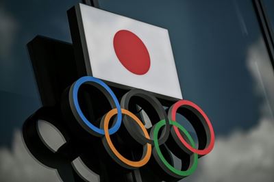 Tokyo Olympics will go ahead 'with or without Covid' - IOC's Coates