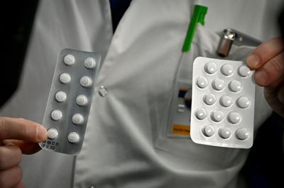 US regulator approves limited use of malaria drugs for virus