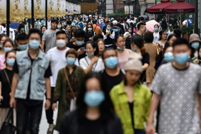 Rebound and reflection in Wuhan as virus claims million lives