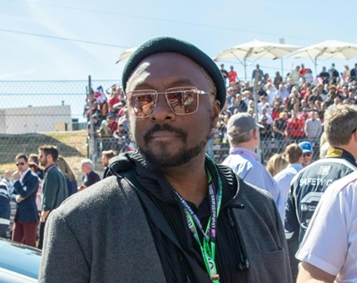Qantas backs legal action against will.i.am over racism claim