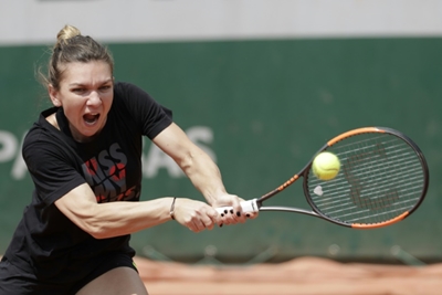 Halep finally makes her bow