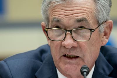 US recovery would be stronger, faster with more aid: Fed's Powell