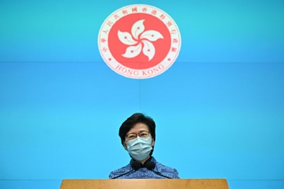 Hong Kong political crisis deepens despite protest lull during virus