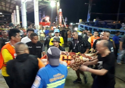 Dozens of missing Chinese tourists assumed trapped in sunken boat off Thai coast