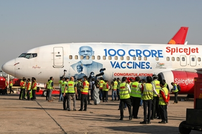 Indian man fined for wanting Modi's face cut from vaccine drive