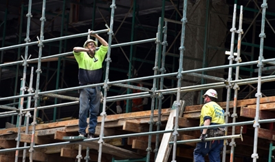 Australia keeps rates on hold at record low