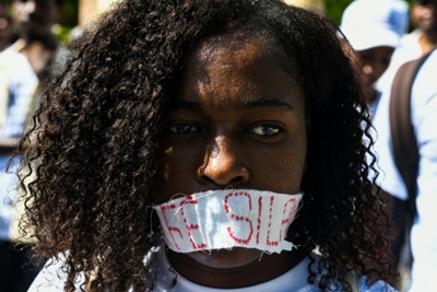 Haitians march against rape after students sexually assaulted