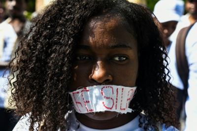 Haitians march against rape after students sexually assaulted