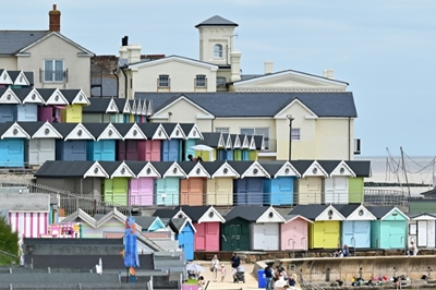 Splash of colour: UK beach huts brighten pandemic gloom