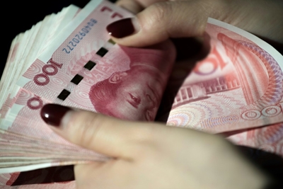 China rejects Trump accusations of currency manipulation