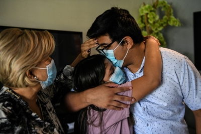 In virus hotspot Florida, a family mourns - and worries about bills