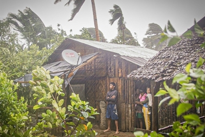 Typhoon forces 140,000 from homes in virus-hit Philippines