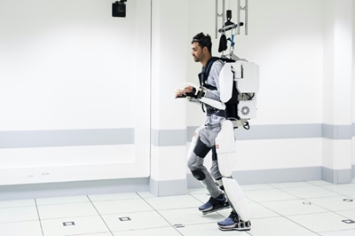 Paralysed man walks again with brain-controlled exoskeleton