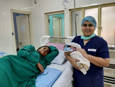 Woman gives birth after helicopter rescue from India floods
