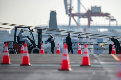 Two more Japan officials aboard ship contract coronavirus