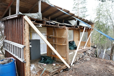 Man saws neighbour's shed in half