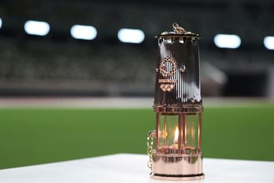 Troubled Olympic flame diverted to Tokyo museum
