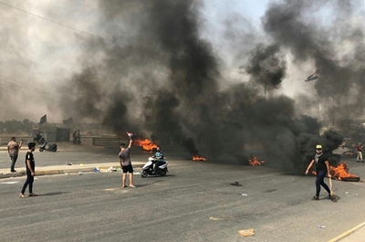 Nine dead as thousands protest across Iraq  