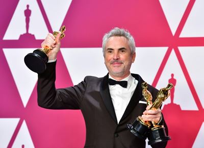 Mexican filmmaker Cuaron backs domestic workers over pay