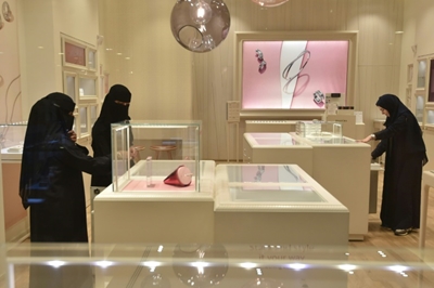 As society opens, Saudi women surge into job market